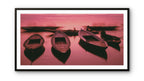 Boats ready for tourists at dawn on the Ganges River.  Banaras, India.