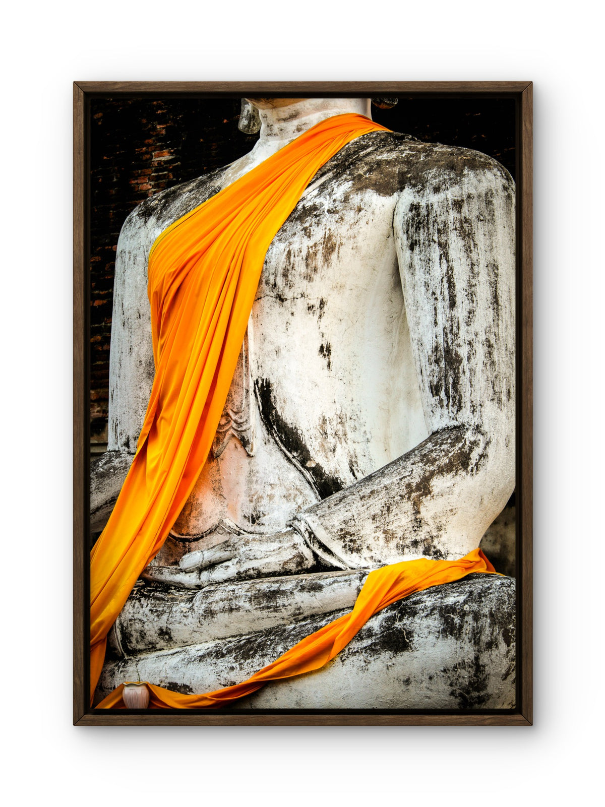 Detail of saffron robes on Buddha.  Ayutthaya, Thailand.